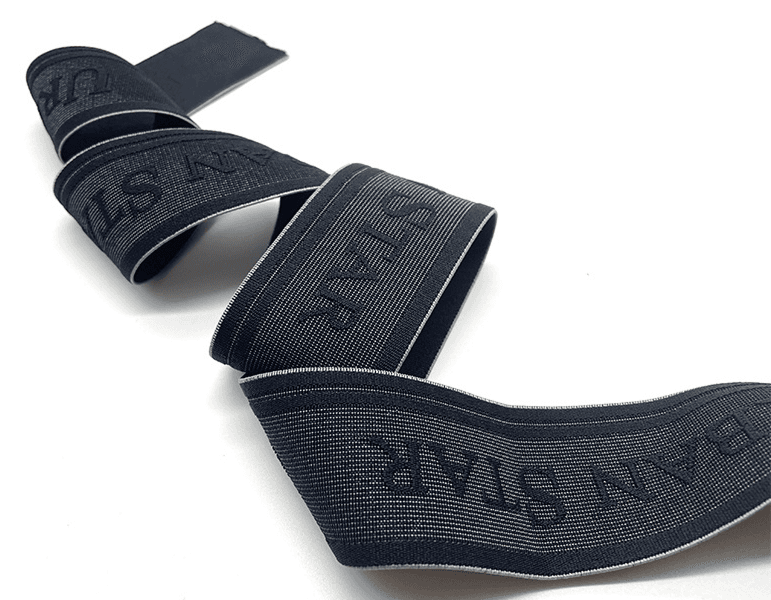 Elastic textile material